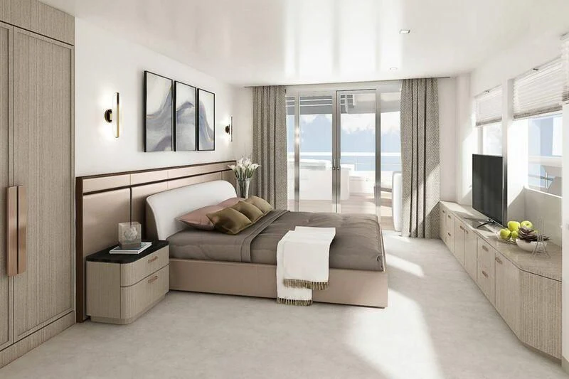 a bedroom with a bed and a tv aboard INDEPENDENCE 135 Yacht for Sale