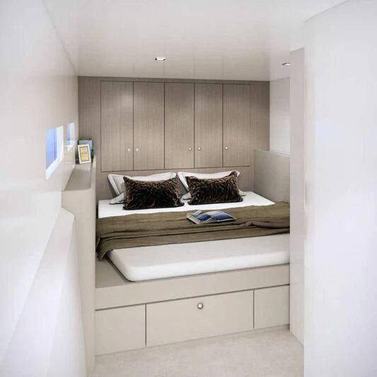 a bed in a room aboard INDEPENDENCE 135 Yacht for Sale