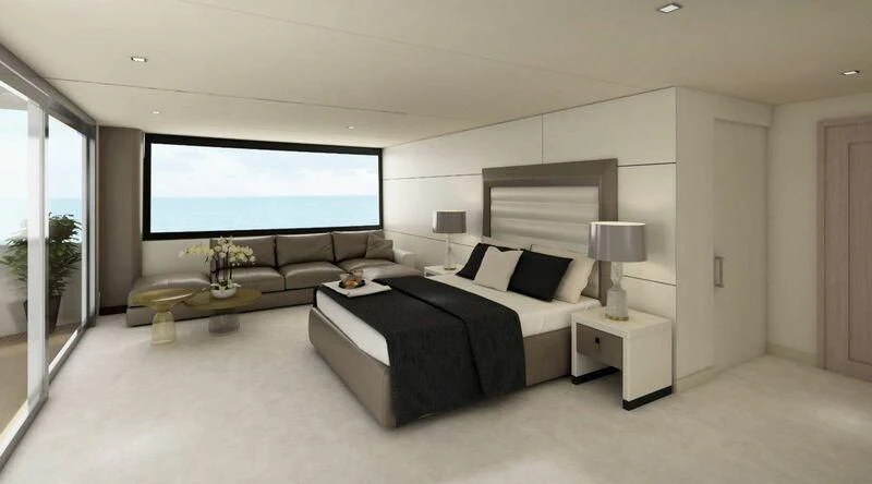 a large bedroom with a large bed aboard INDEPENDENCE 135 Yacht for Sale