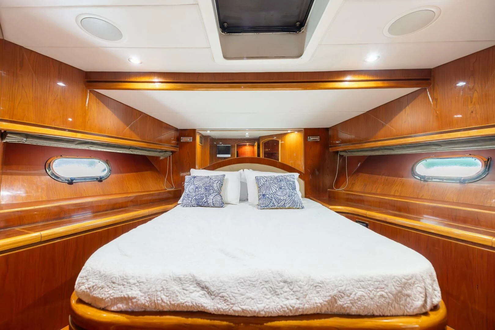 a room with a bed and a window aboard OCEAN 1 Yacht for Sale