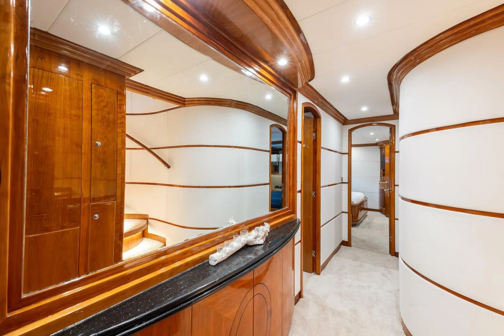 a bathroom with a large mirror aboard OCEAN 1 Yacht for Sale