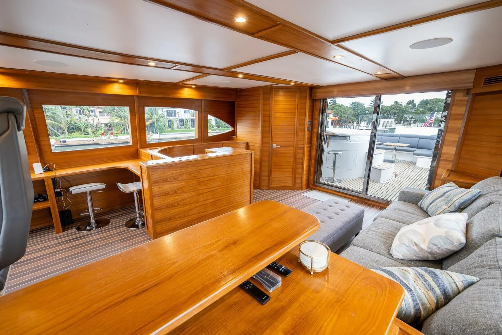 a cabin with a couch and a table aboard OCEAN 1 Yacht for Sale