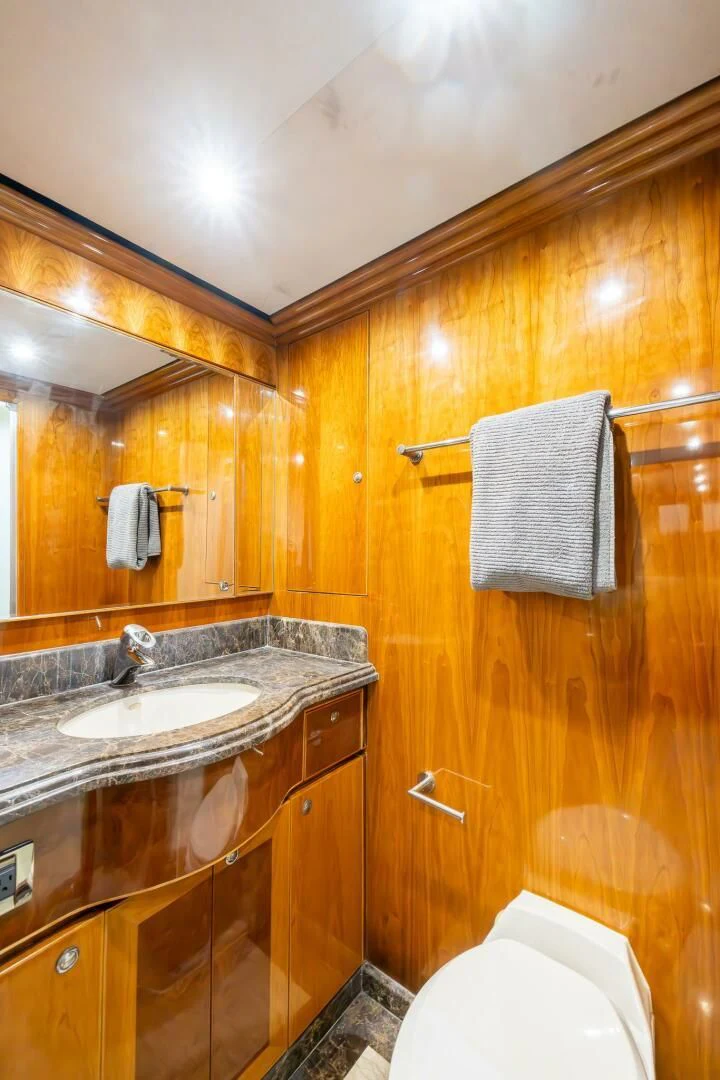 a bathroom with a sink and a toilet aboard OCEAN 1 Yacht for Sale