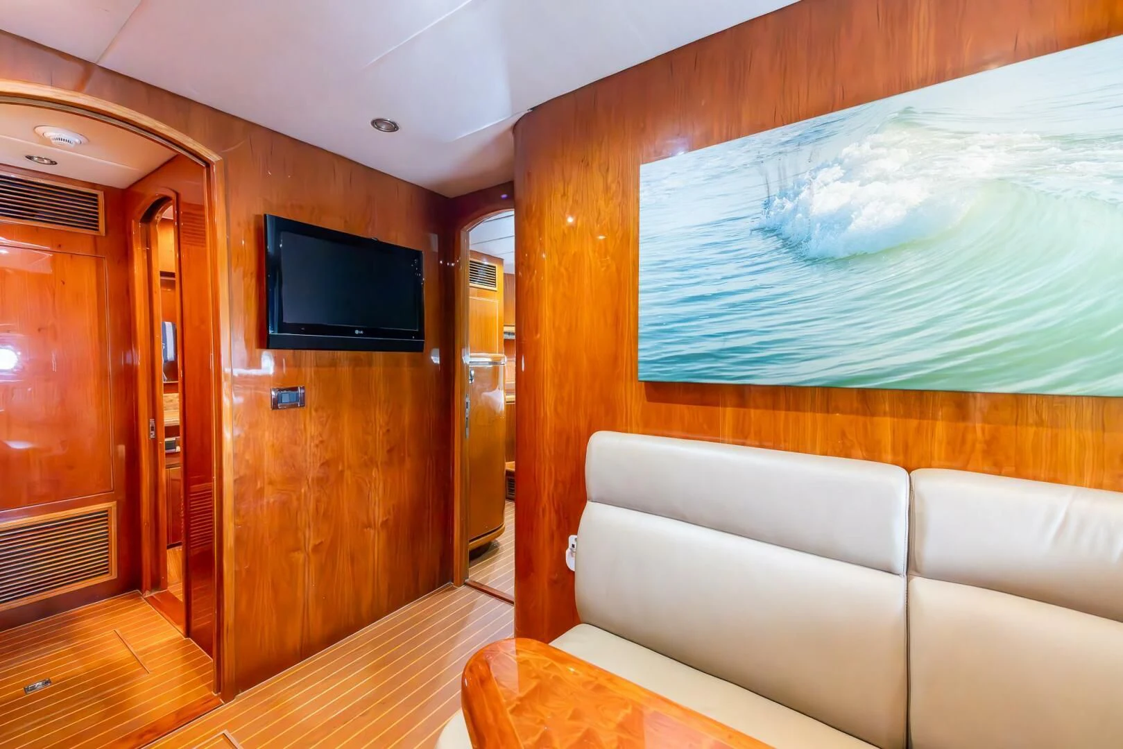 a room with a bed and a television aboard OCEAN 1 Yacht for Sale