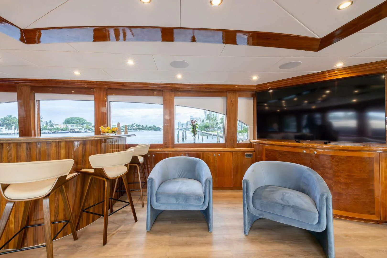 a room with chairs and a table aboard OCEAN 1 Yacht for Sale