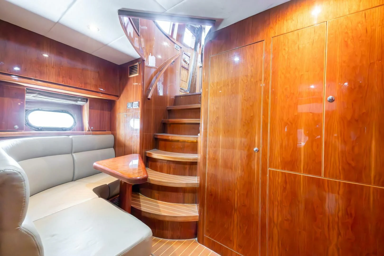 a wooden staircase in a room aboard OCEAN 1 Yacht for Sale