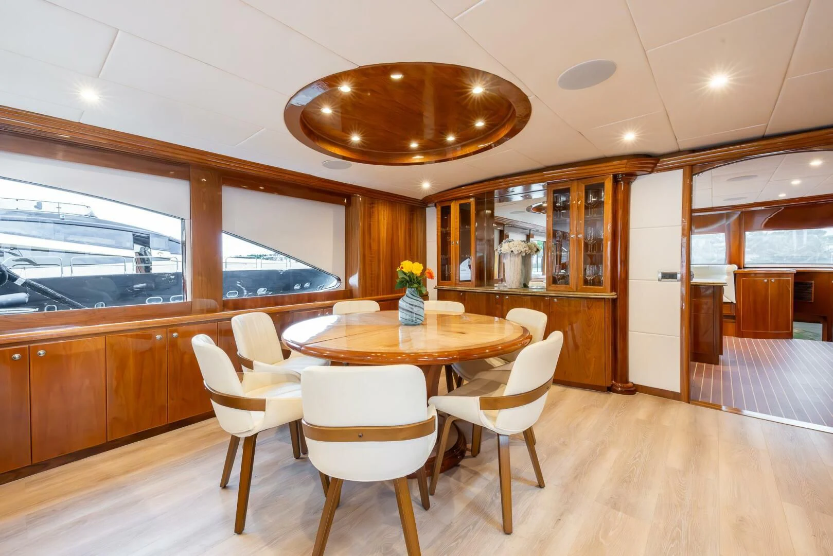 a dining room with a table and chairs aboard OCEAN 1 Yacht for Sale