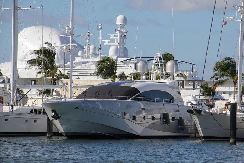 a couple of boats in a harbor aboard KESTREL Yacht for Sale