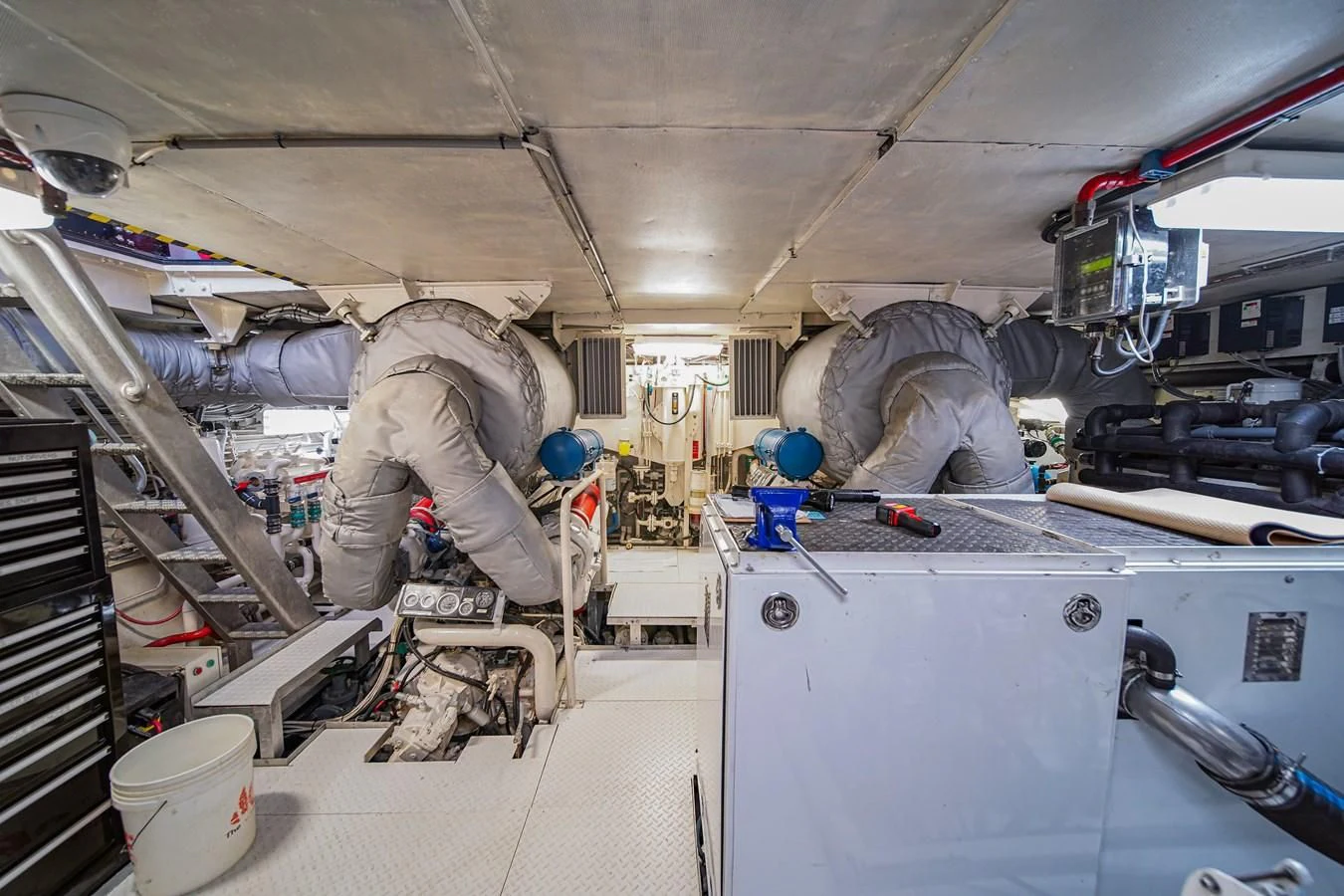 a person working on a machine aboard AVALON Yacht for Sale