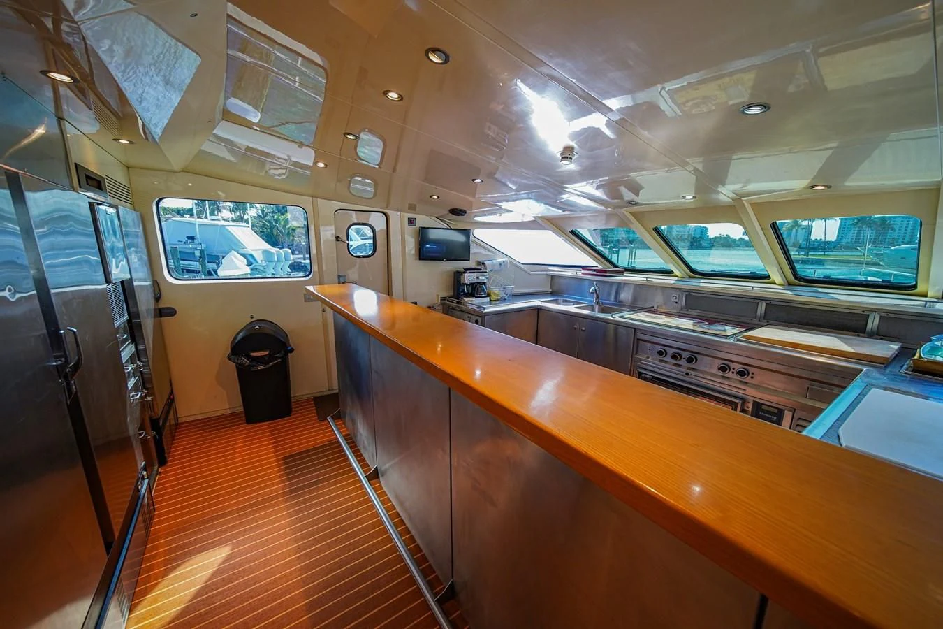 a room with a counter and a television aboard AVALON Yacht for Sale