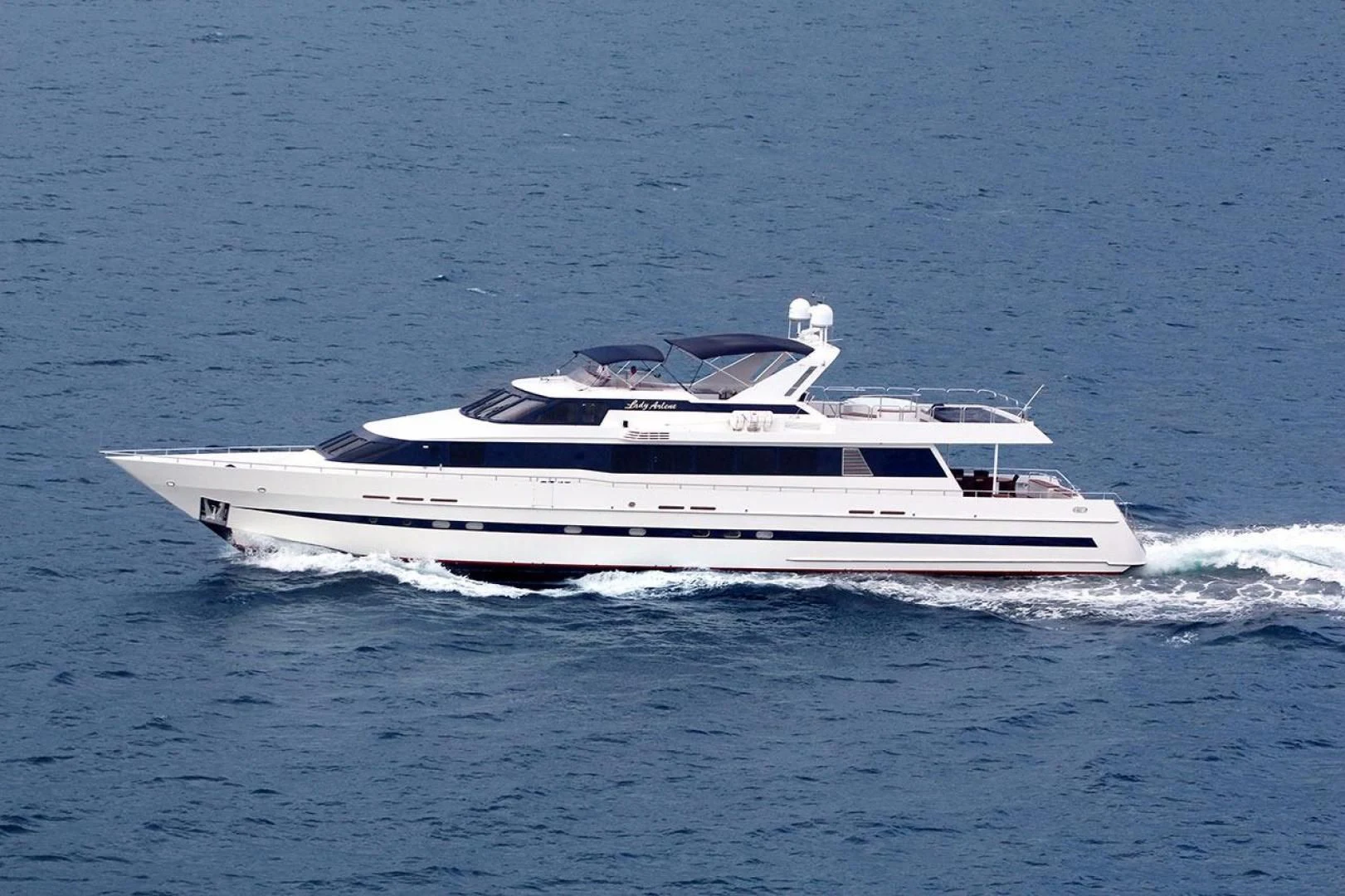 a white yacht on the water aboard AVALON Yacht for Sale