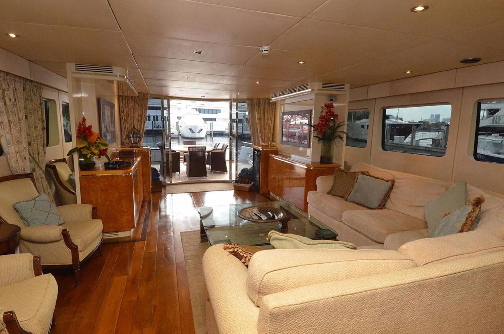 a living room with a large window aboard AVALON Yacht for Sale