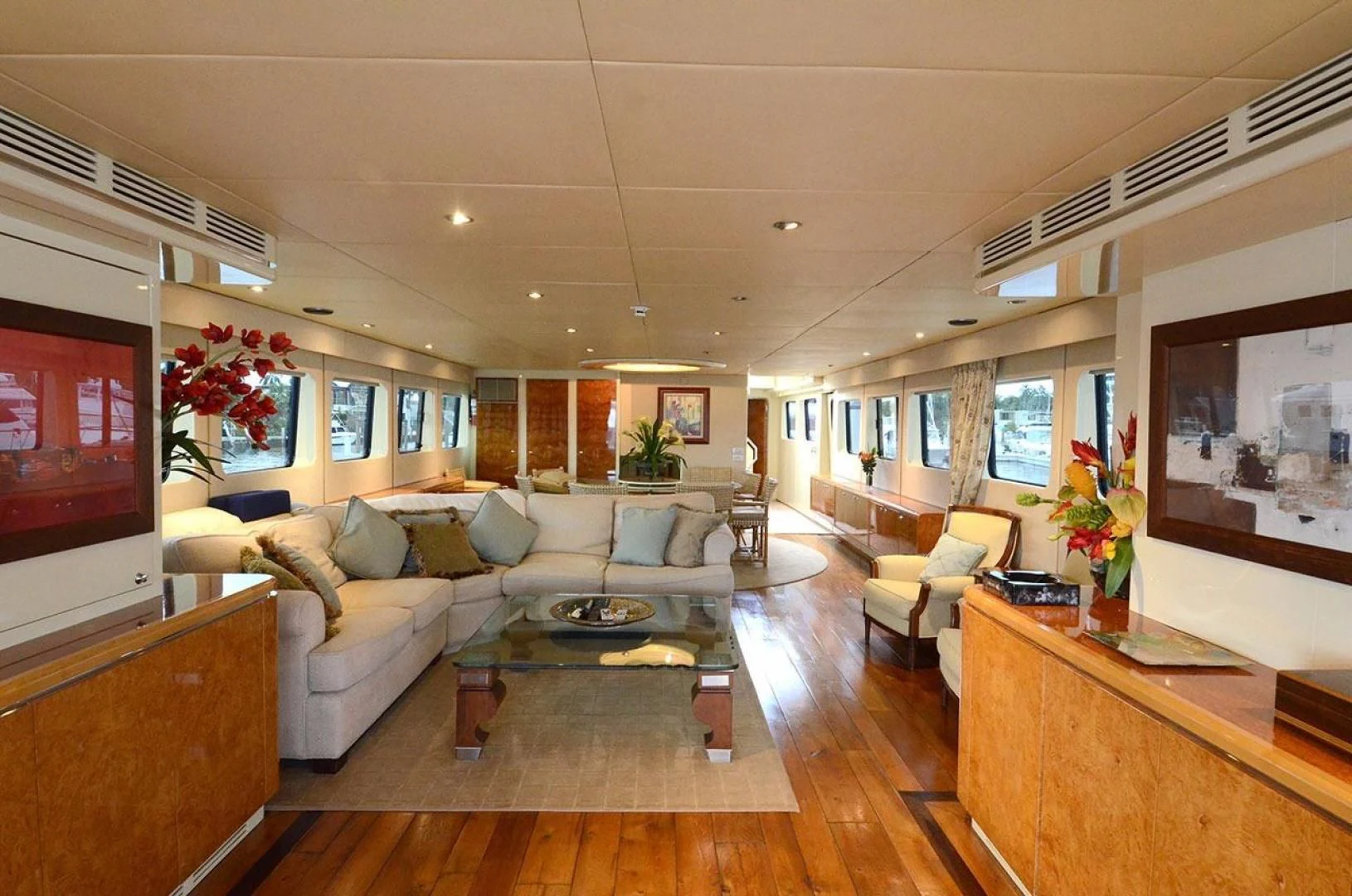 a living room with a large window aboard AVALON Yacht for Sale