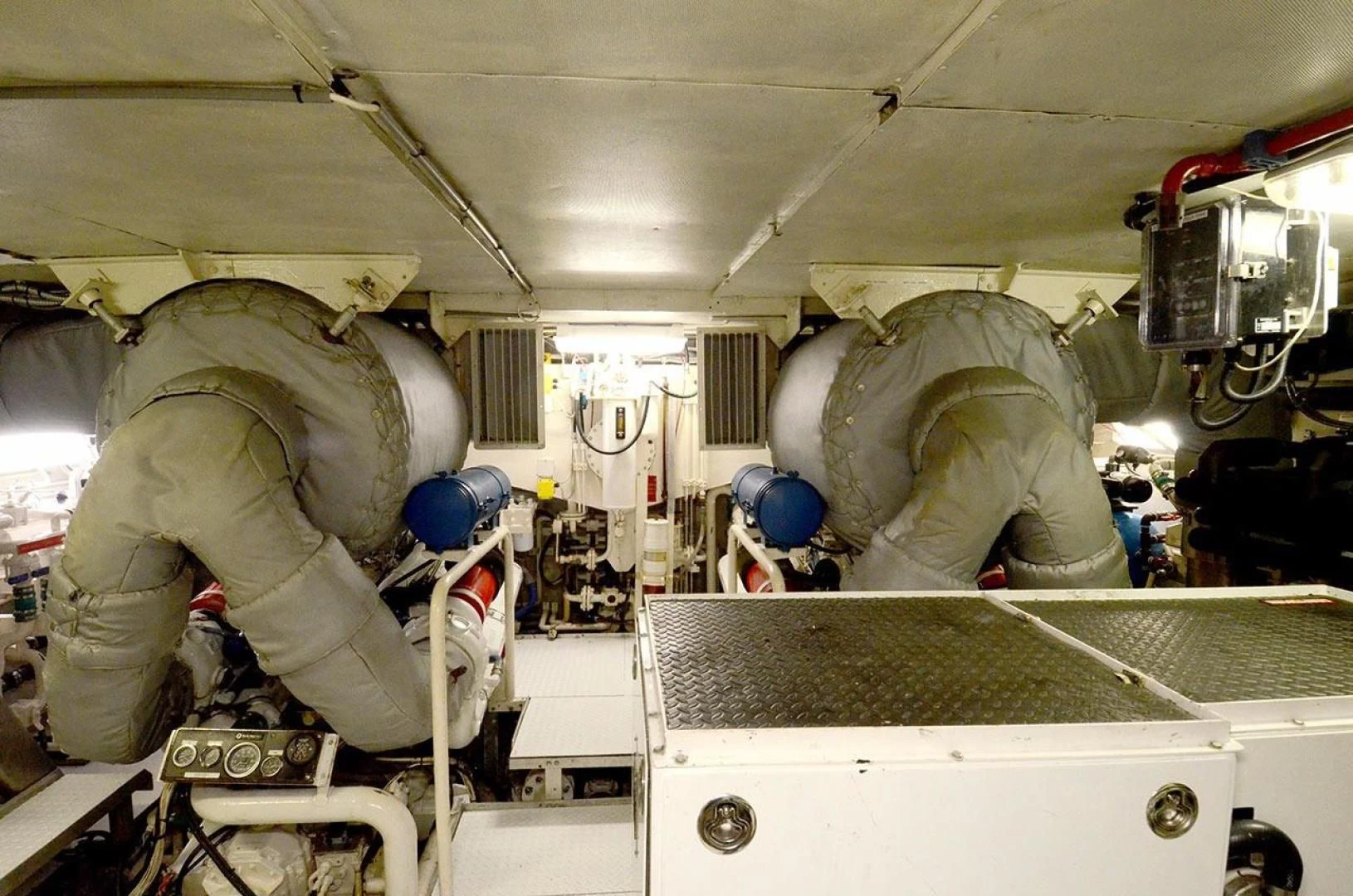 a few people working in a room aboard AVALON Yacht for Sale