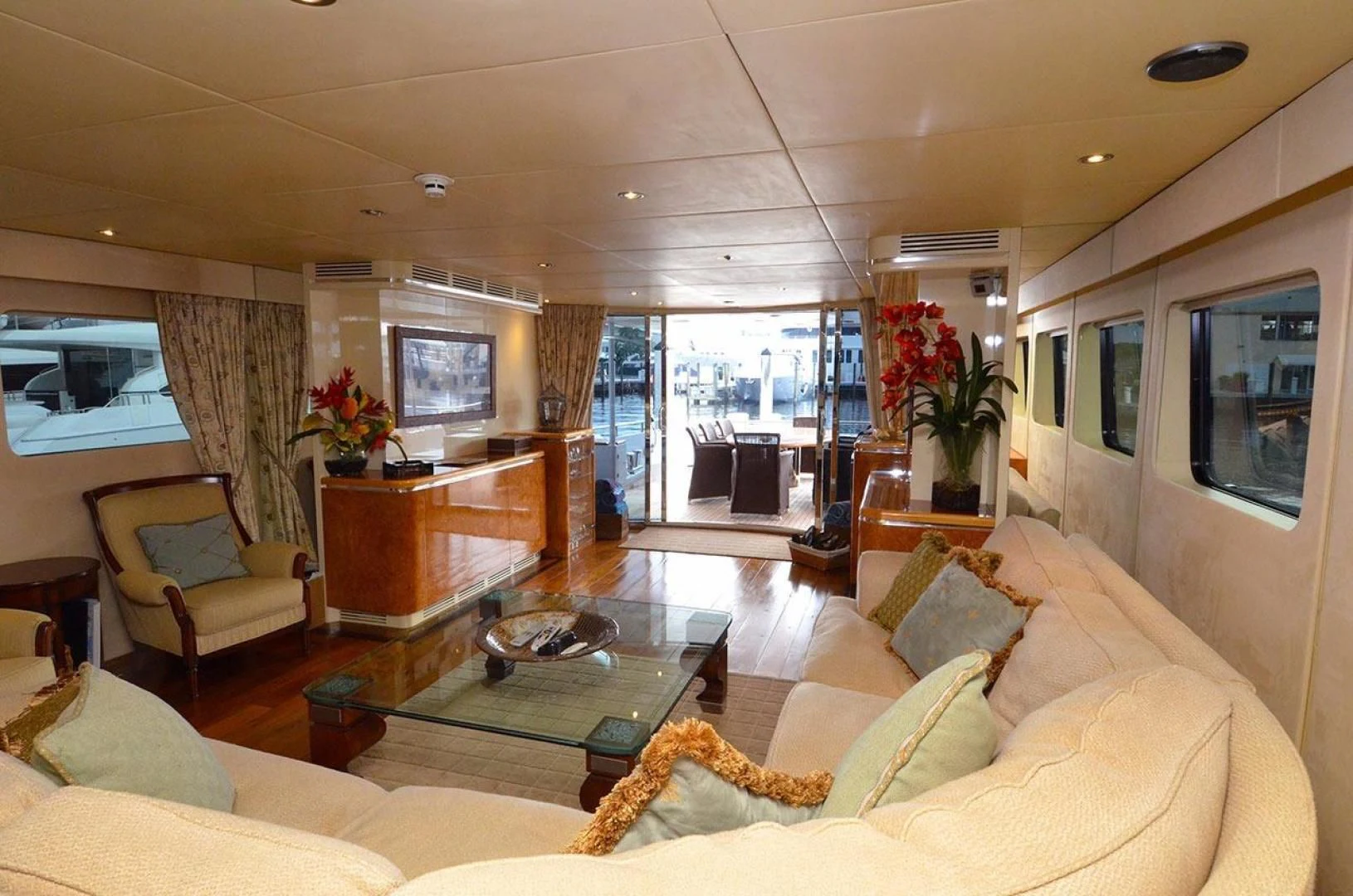 a living room with a large window aboard AVALON Yacht for Sale