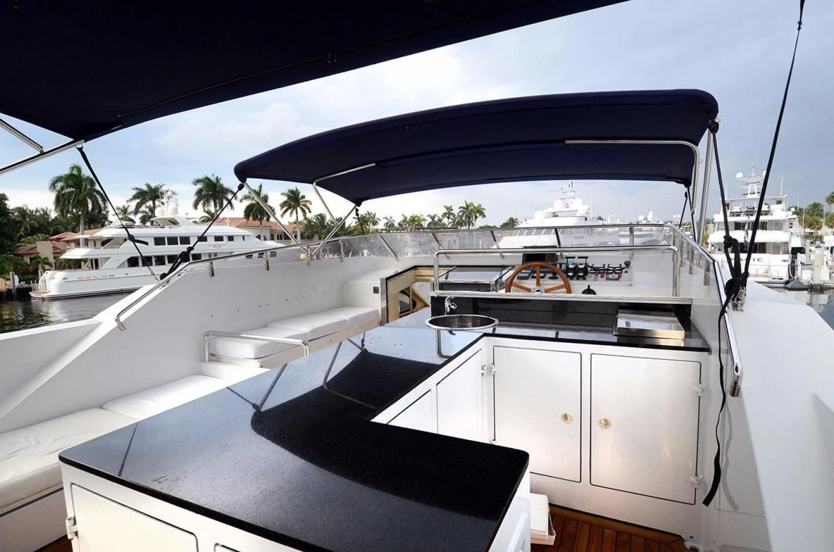 a boat docked at a pier aboard AVALON Yacht for Sale