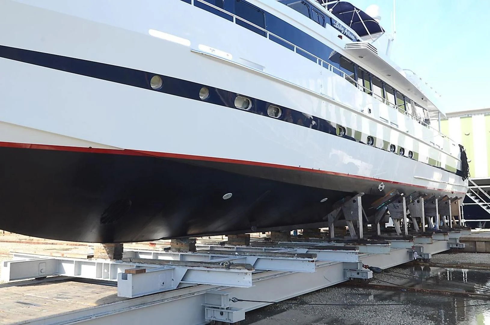 a large cruise ship docked aboard AVALON Yacht for Sale