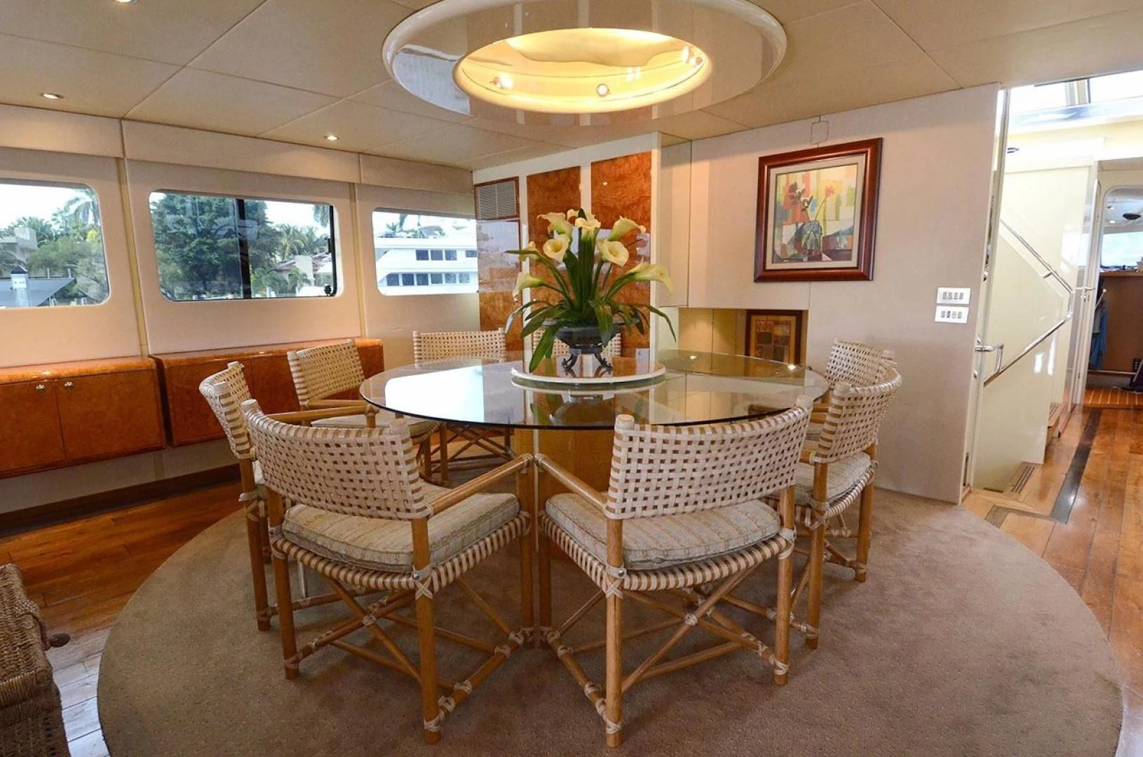 a dining room with chairs and a table aboard AVALON Yacht for Sale