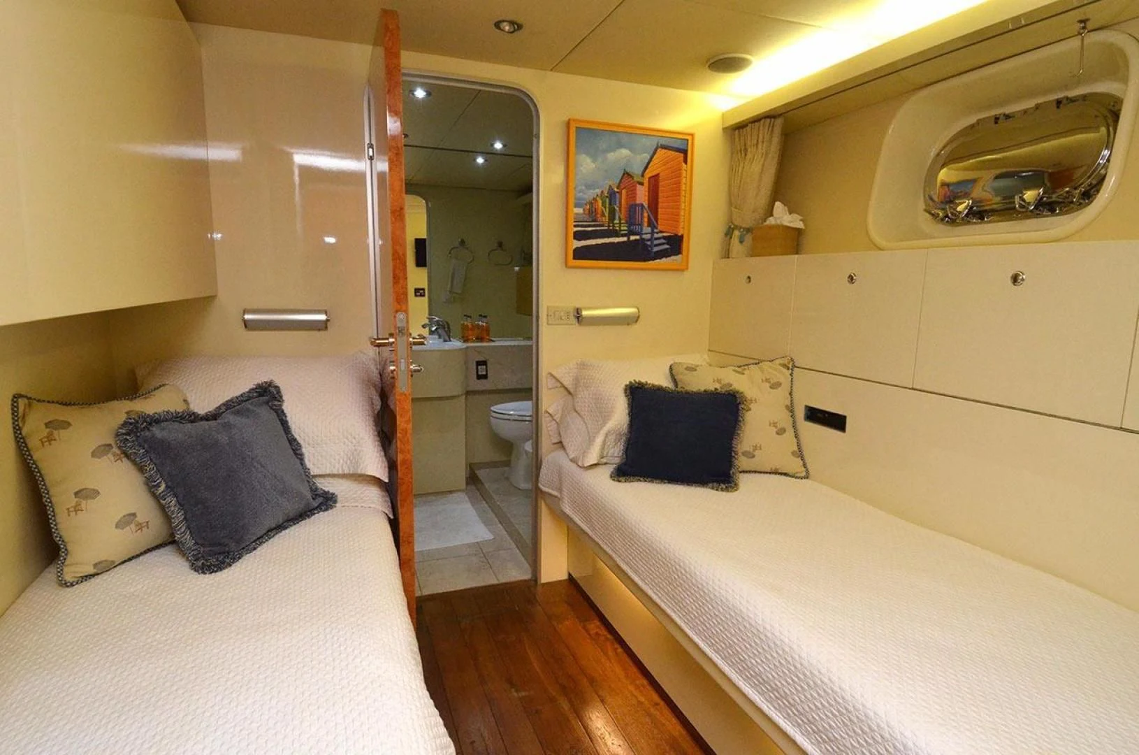 a room with two beds aboard AVALON Yacht for Sale