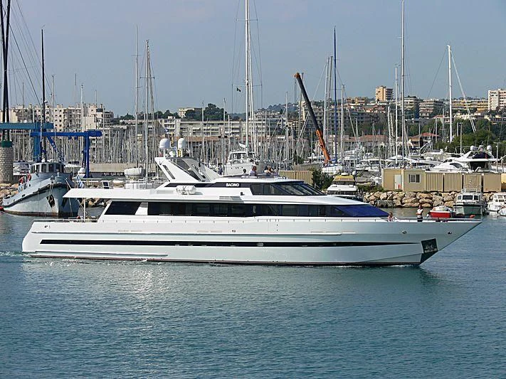 a white yacht in a harbor aboard AVALON Yacht for Sale