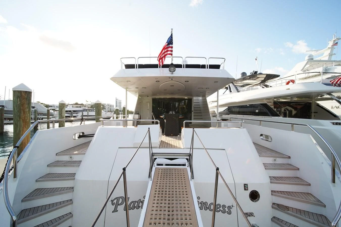 a boat with a flag on the front aboard AVALON Yacht for Sale