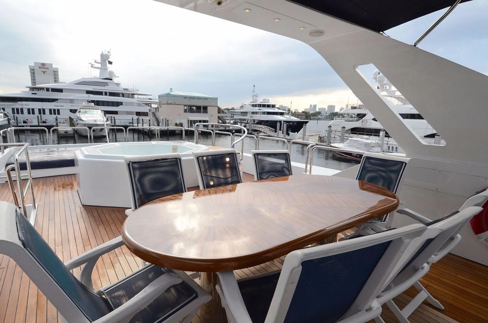 a table with chairs on it aboard AVALON Yacht for Sale