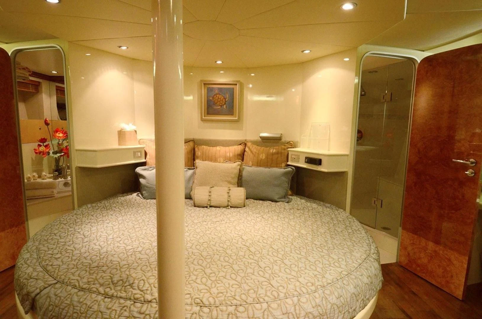 a bedroom with a large bed aboard AVALON Yacht for Sale