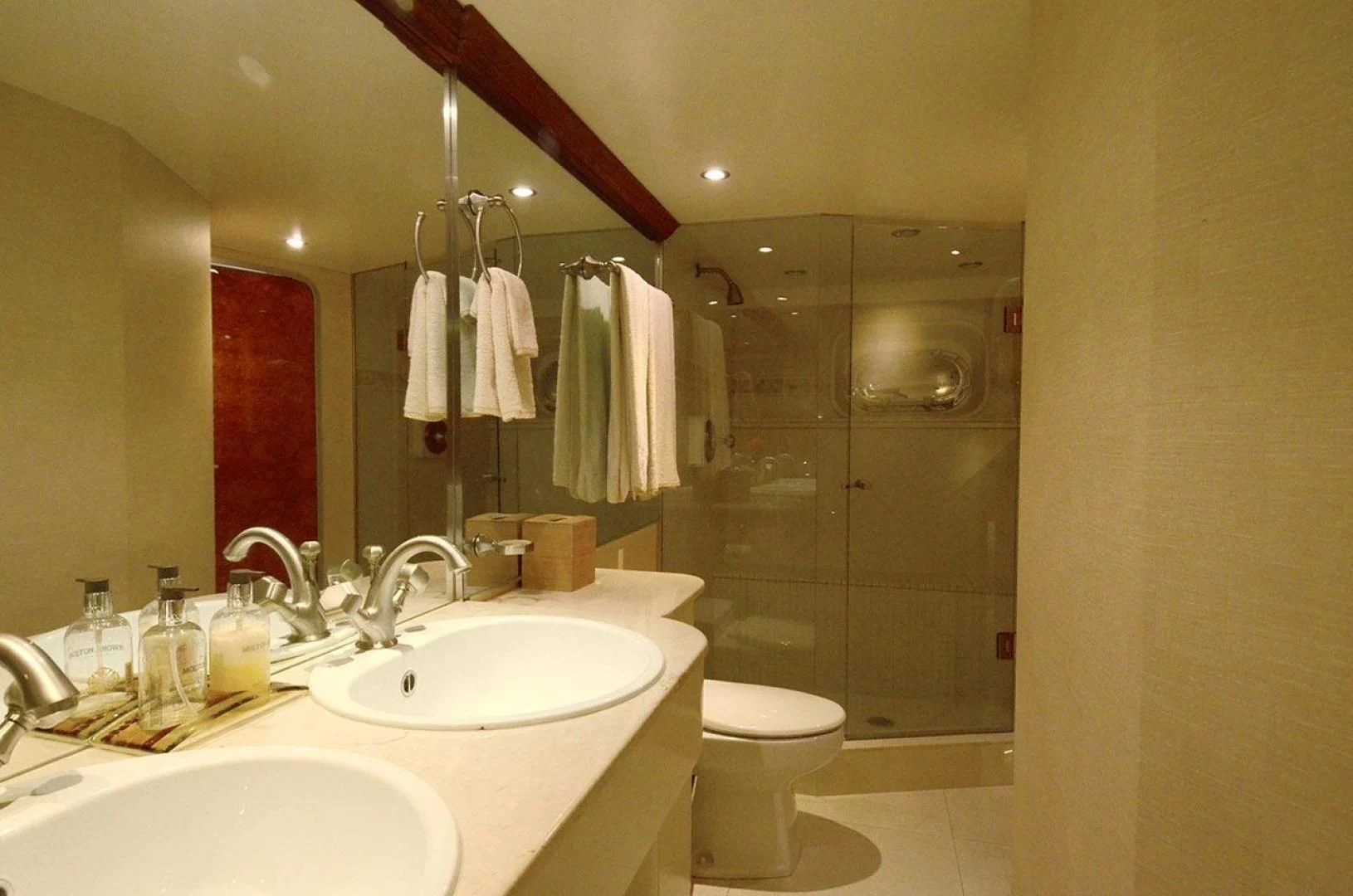 a bathroom with a large mirror aboard AVALON Yacht for Sale