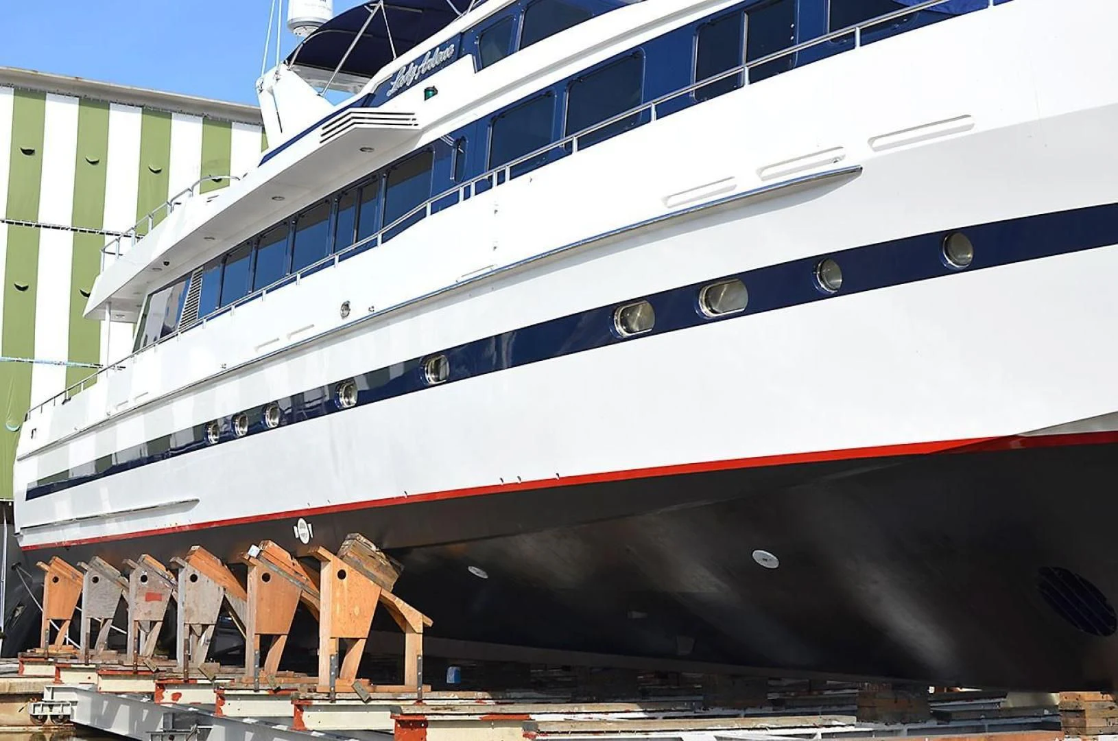 a large cruise ship docked aboard AVALON Yacht for Sale