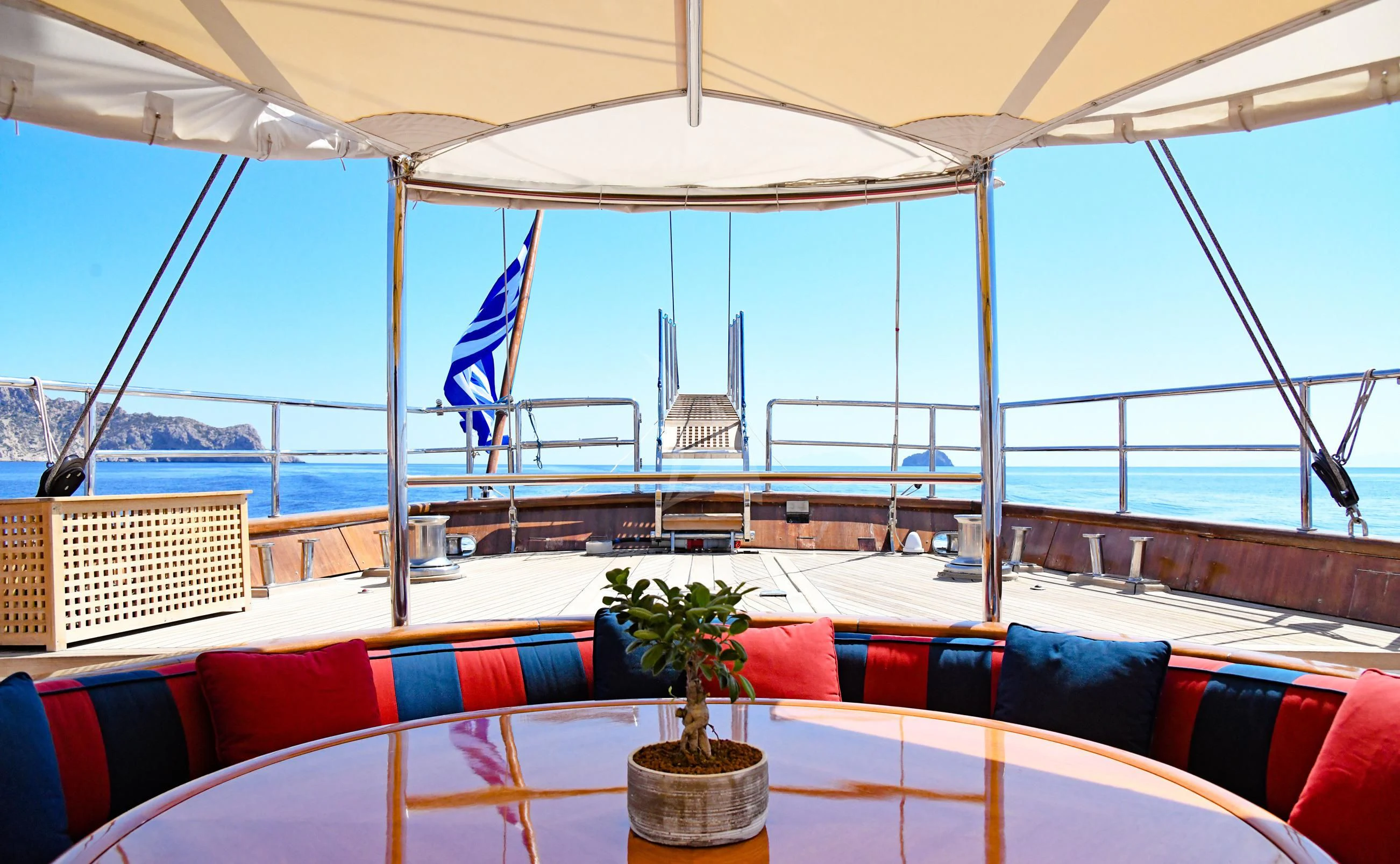 a boat with a vase of flowers aboard TAMARITA Yacht for Sale
