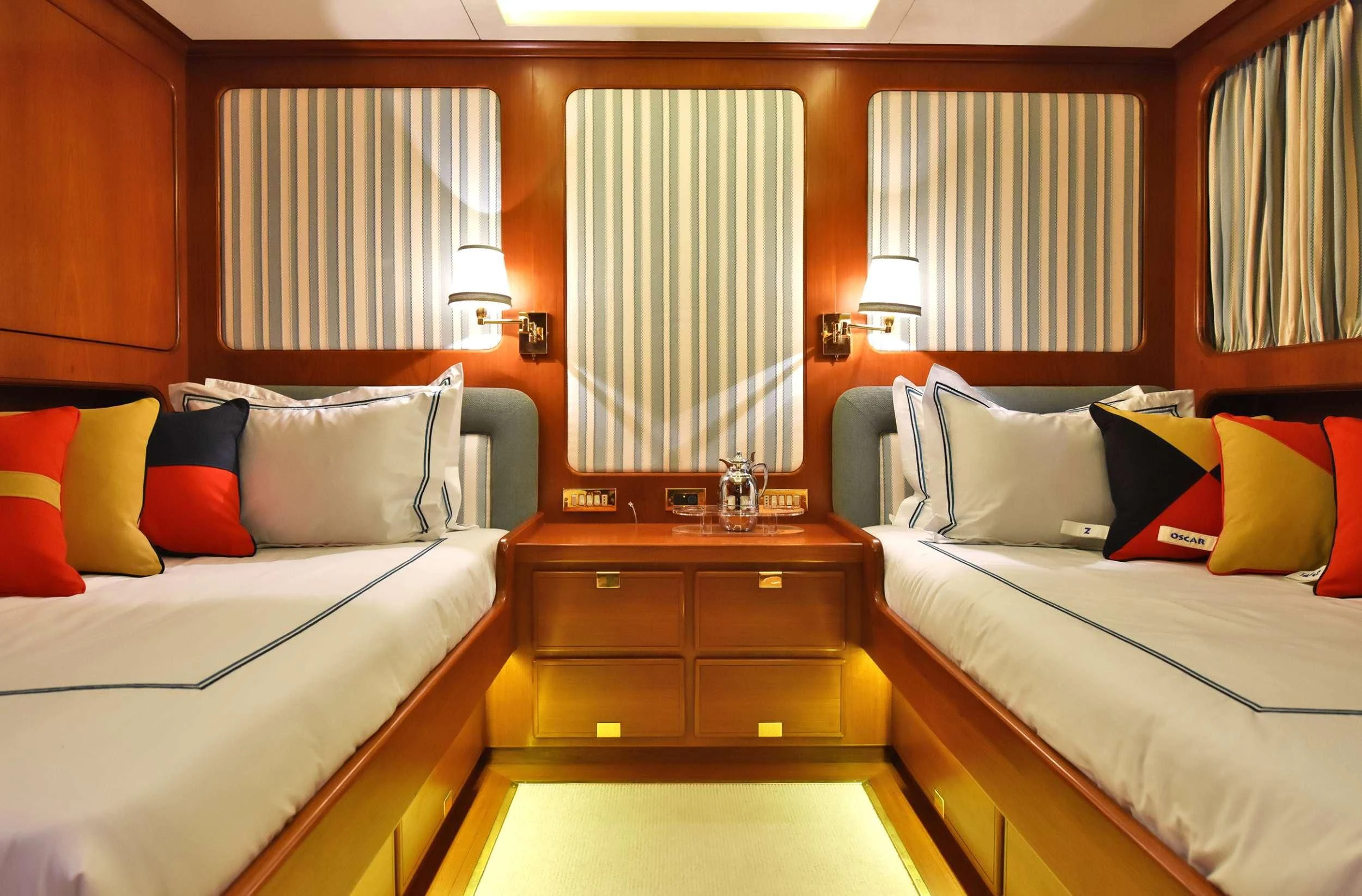 a room with two beds aboard TAMARITA Yacht for Sale