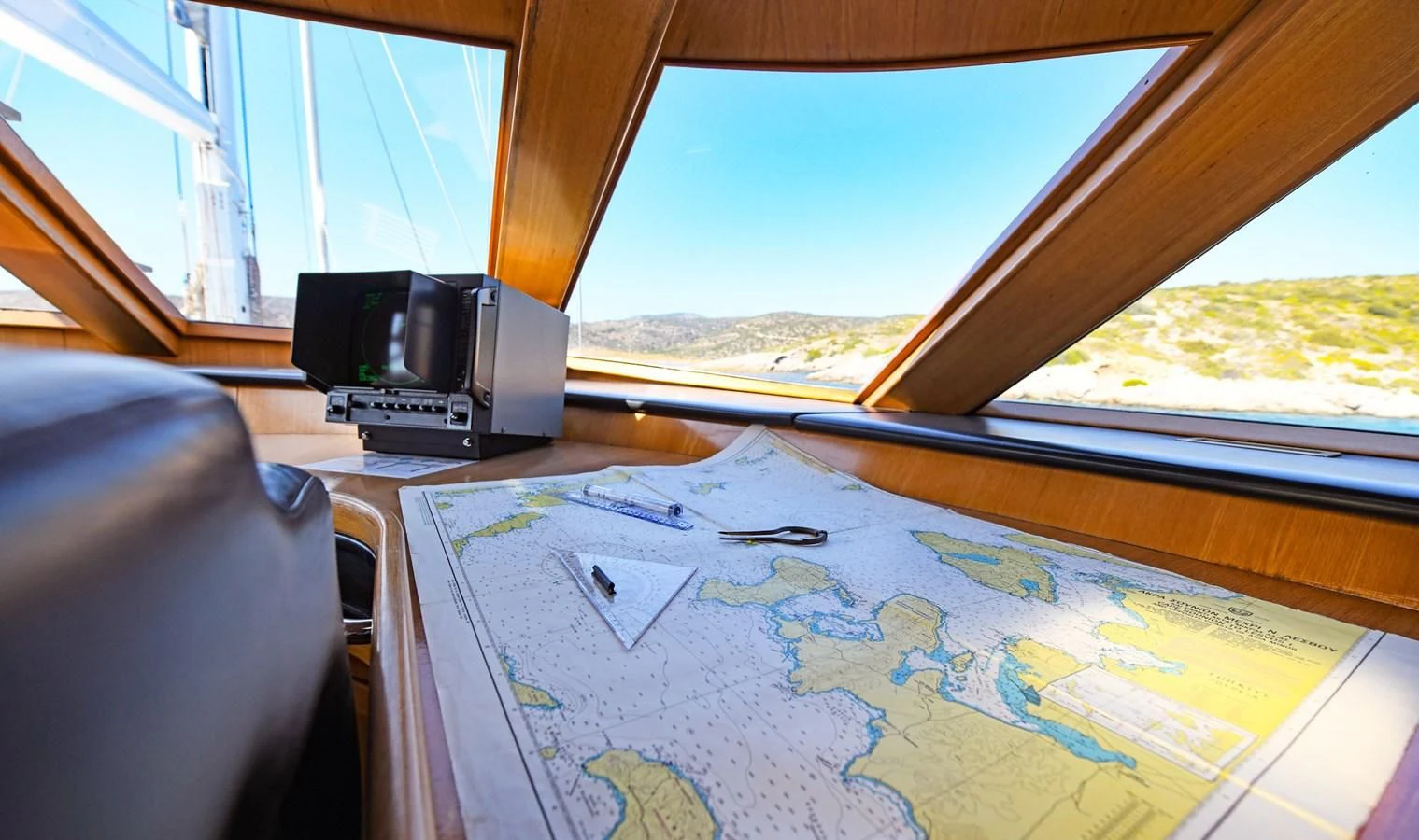 a camera on a map aboard TAMARITA Yacht for Sale