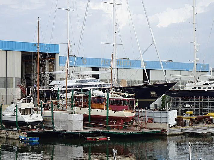 boats docked in a harbor aboard TAMARITA Yacht for Sale