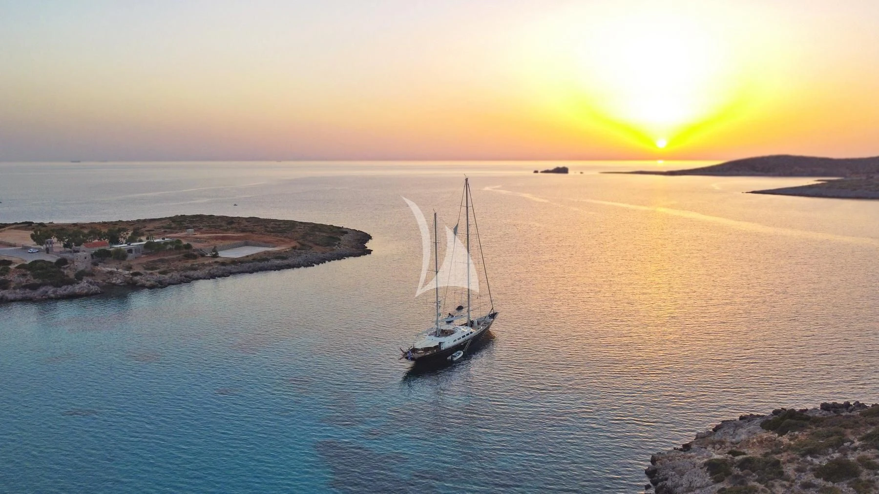 a sailboat in the ocean aboard TAMARITA Yacht for Sale