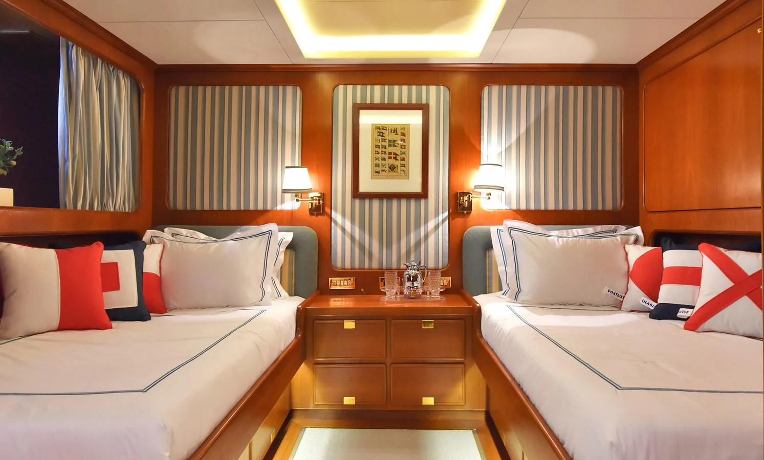 a room with two beds aboard TAMARITA Yacht for Sale