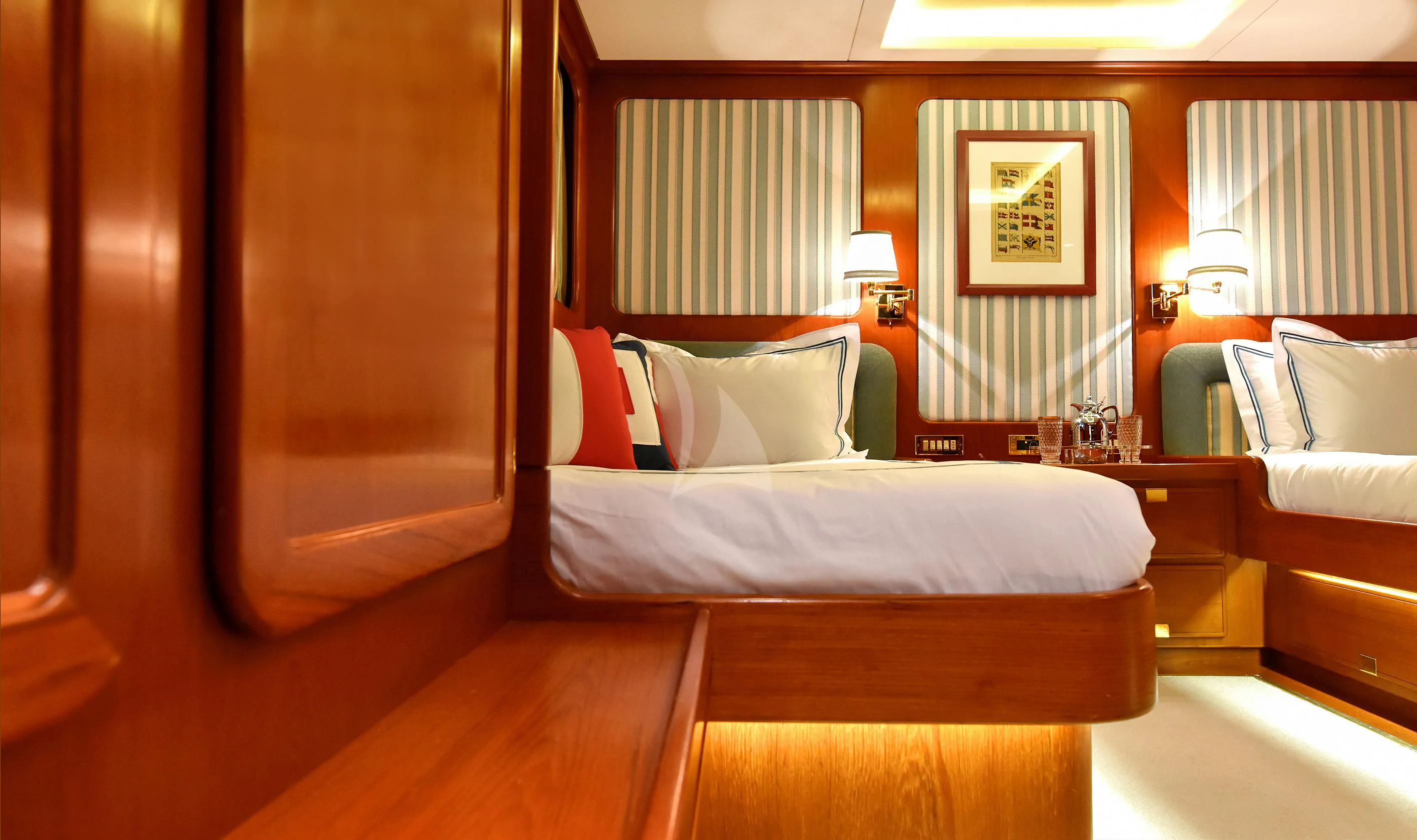 a room with two beds aboard TAMARITA Yacht for Sale