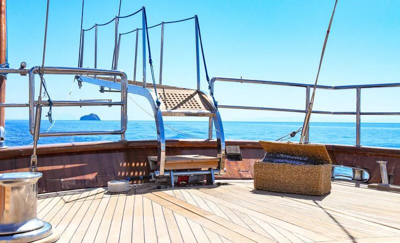 a boat on a deck aboard TAMARITA Yacht for Sale