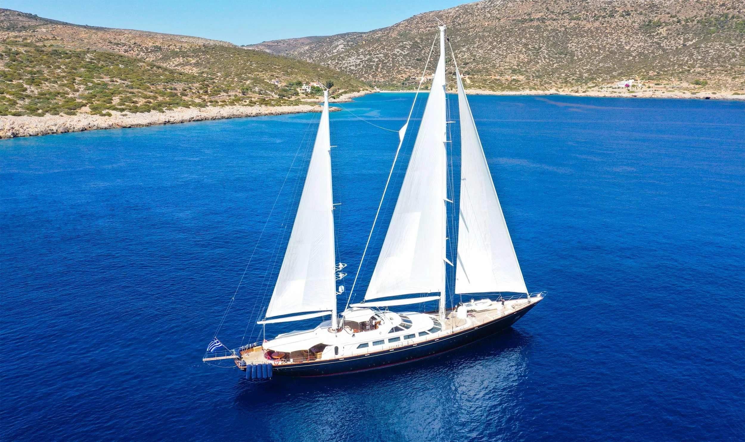 a sailboat on the water aboard TAMARITA Yacht for Sale
