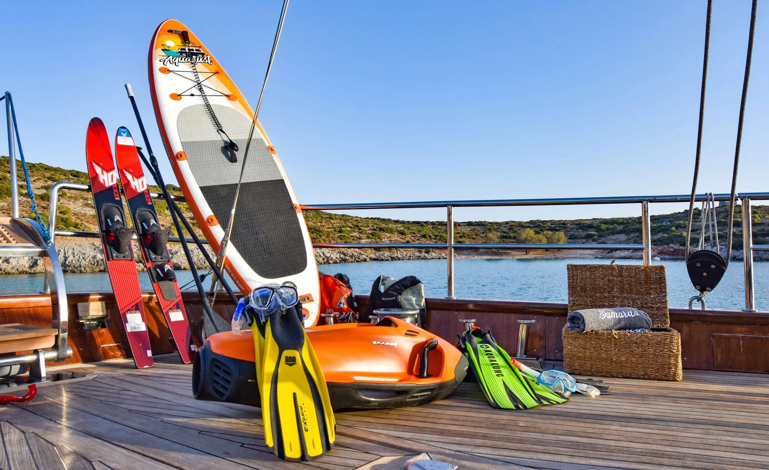 a group of boats sit on a dock aboard TAMARITA Yacht for Sale