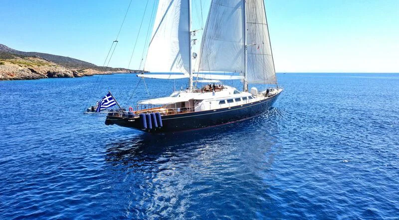 a boat sailing on the water aboard TAMARITA Yacht for Sale
