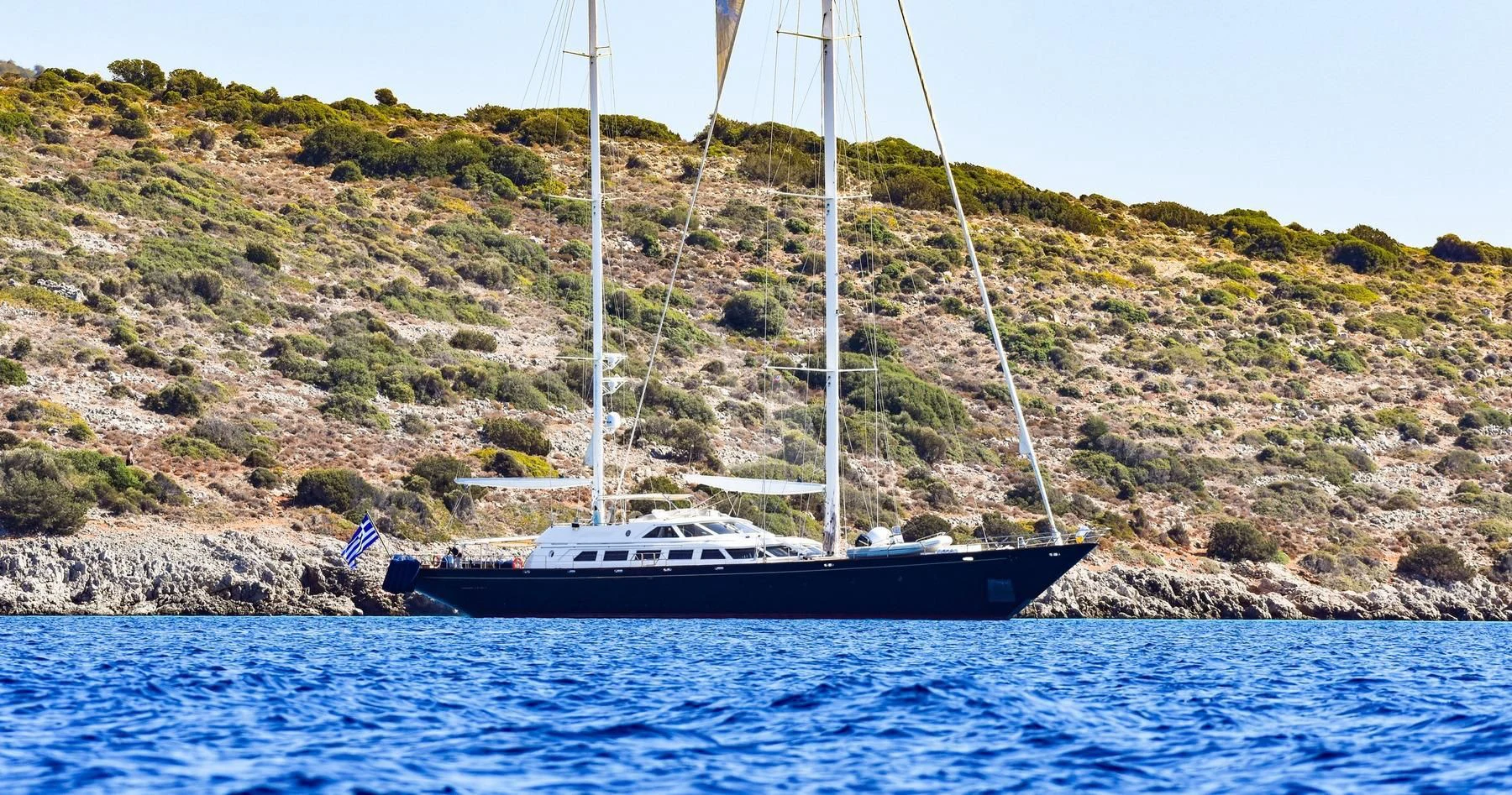 a boat on the water aboard TAMARITA Yacht for Sale
