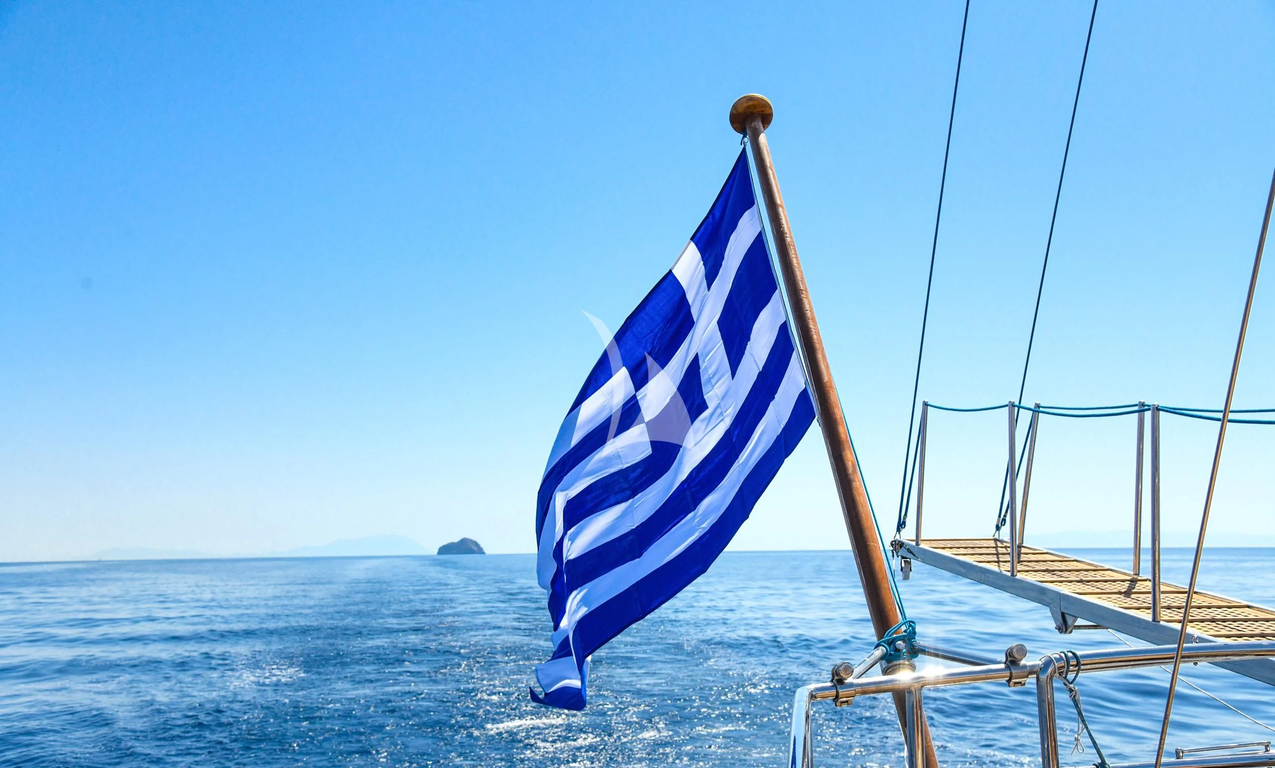 a flag on a boat aboard TAMARITA Yacht for Sale