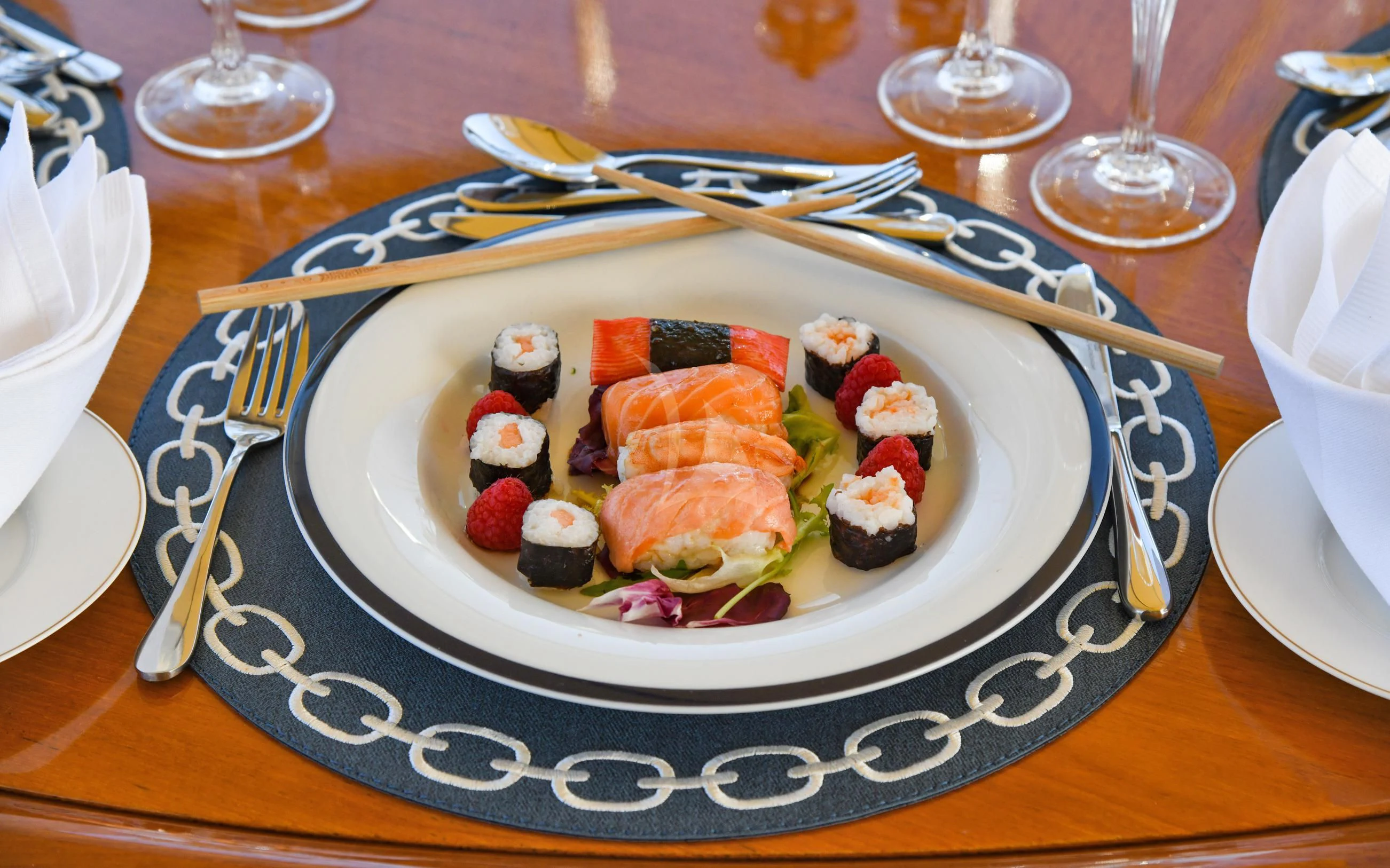 a plate of sushi aboard TAMARITA Yacht for Sale