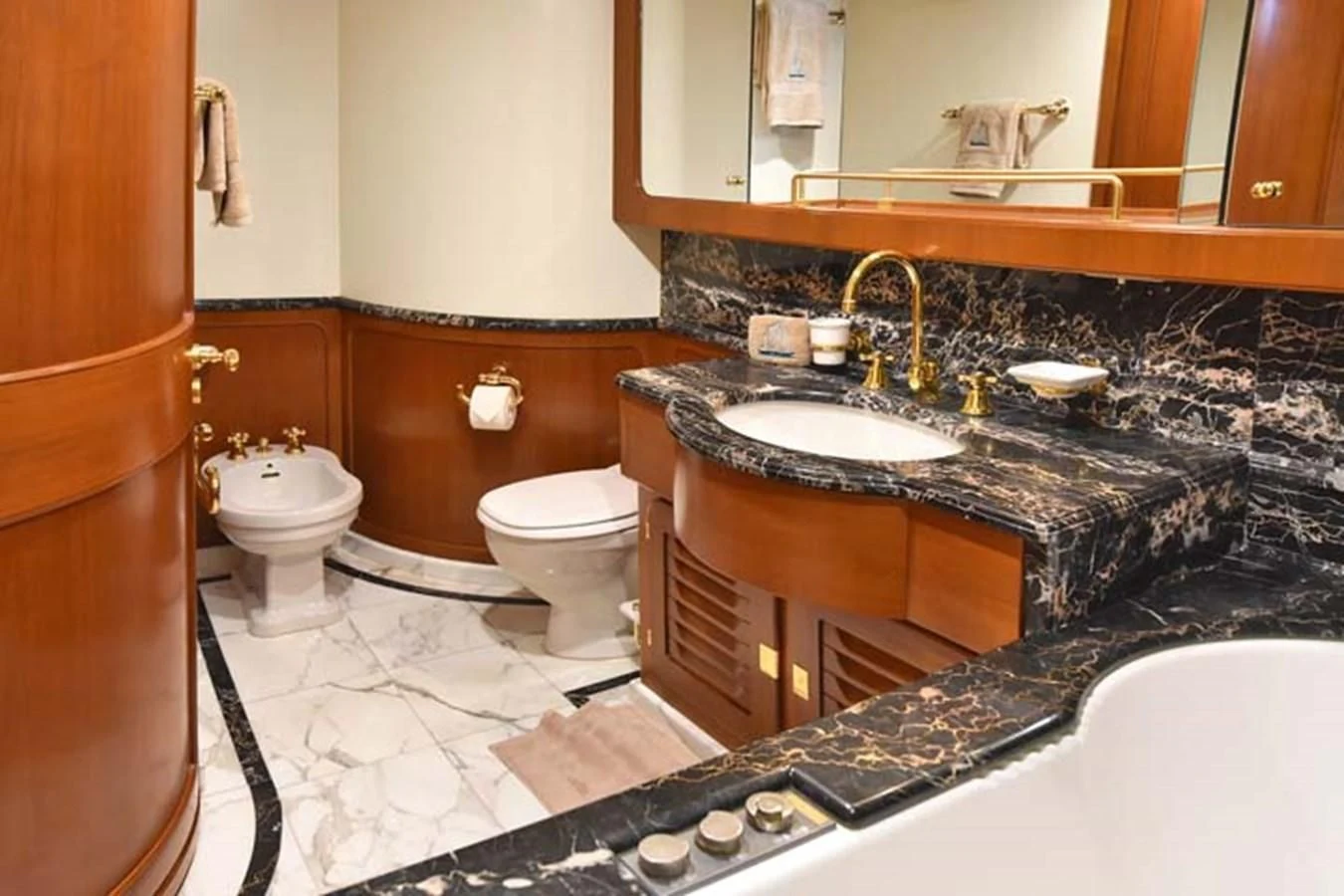 a bathroom with a large countertop aboard TAMARITA Yacht for Sale