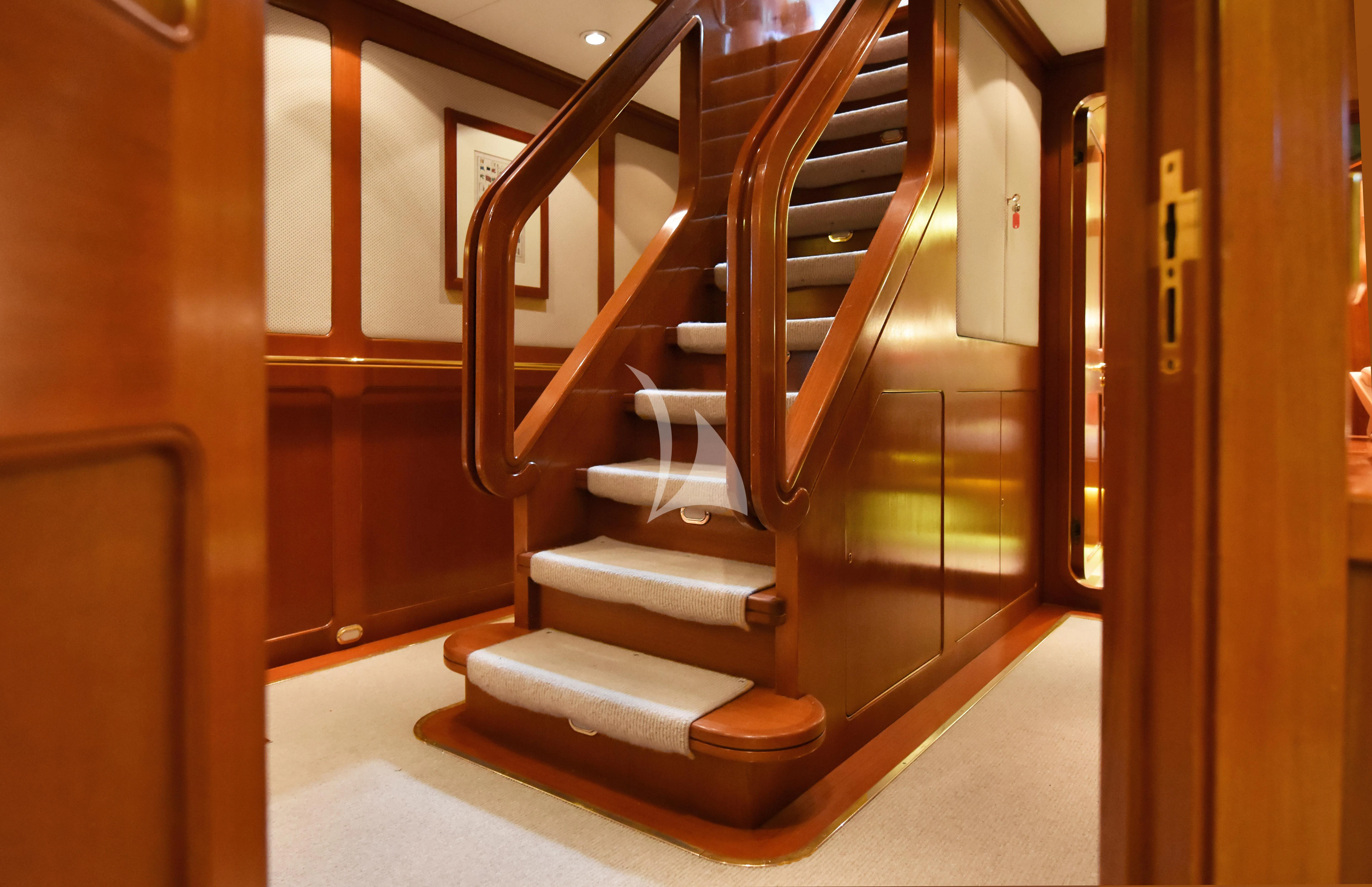a staircase in a building aboard TAMARITA Yacht for Sale