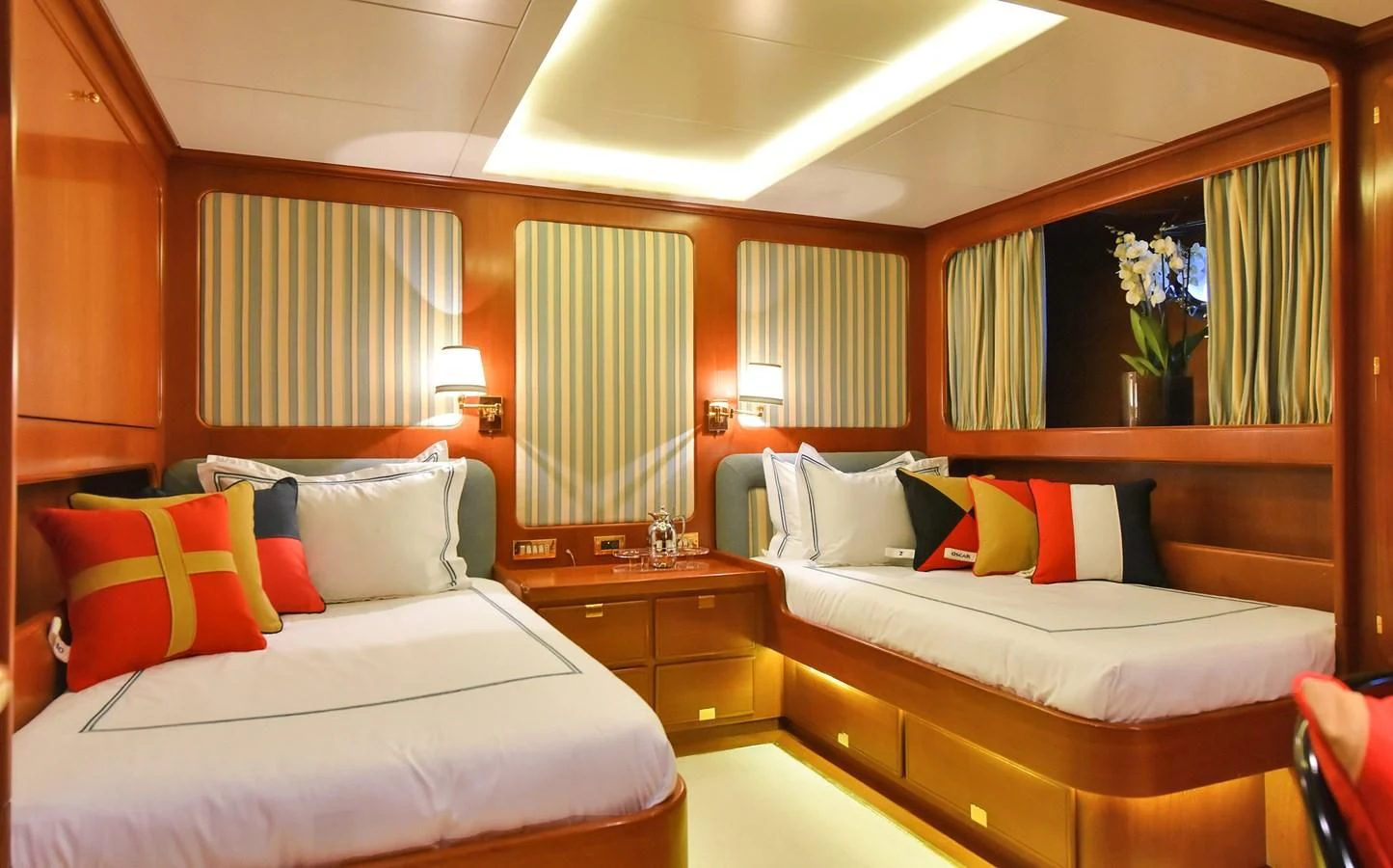 a room with two beds aboard TAMARITA Yacht for Sale
