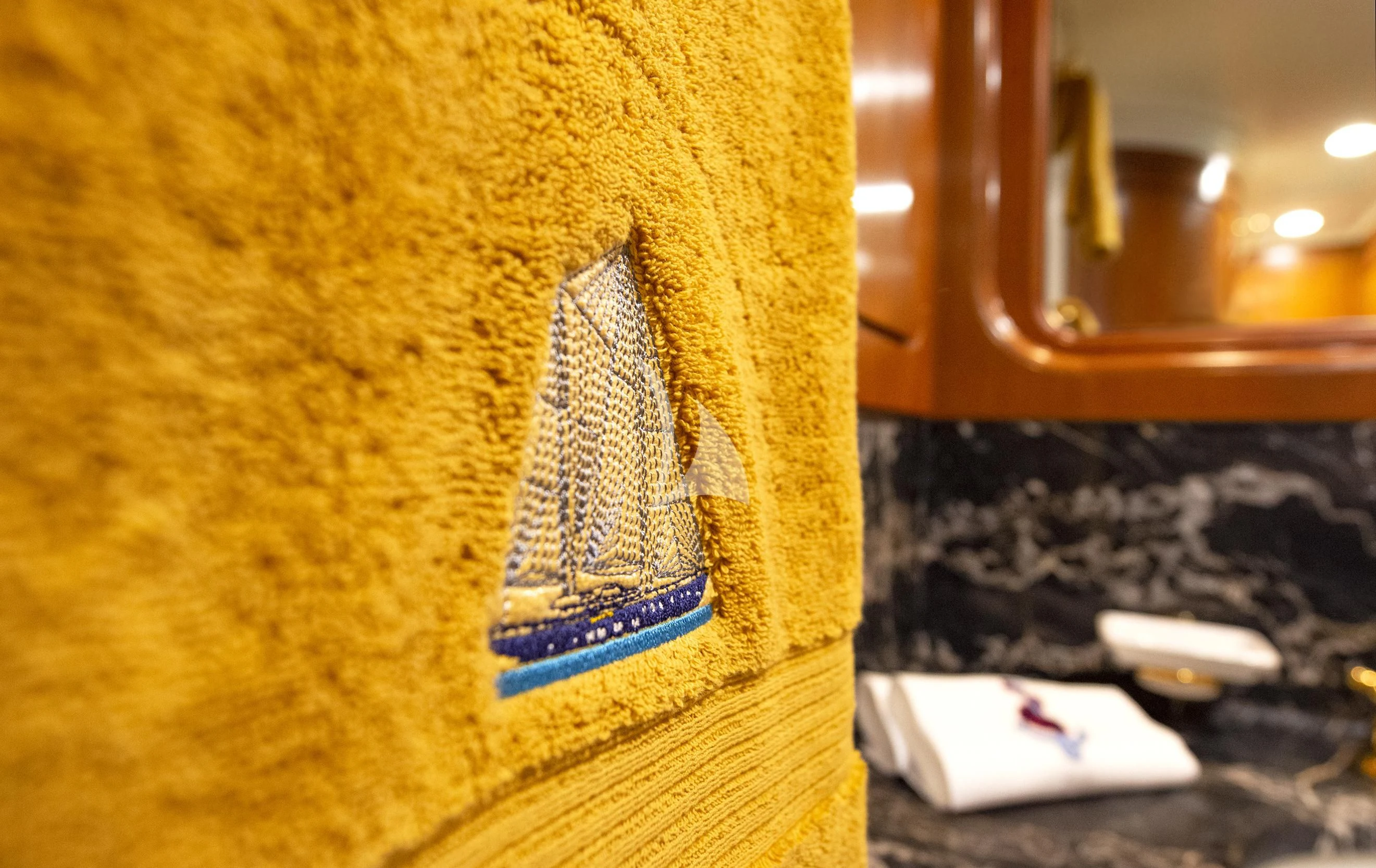 a brown leather chair aboard TAMARITA Yacht for Sale