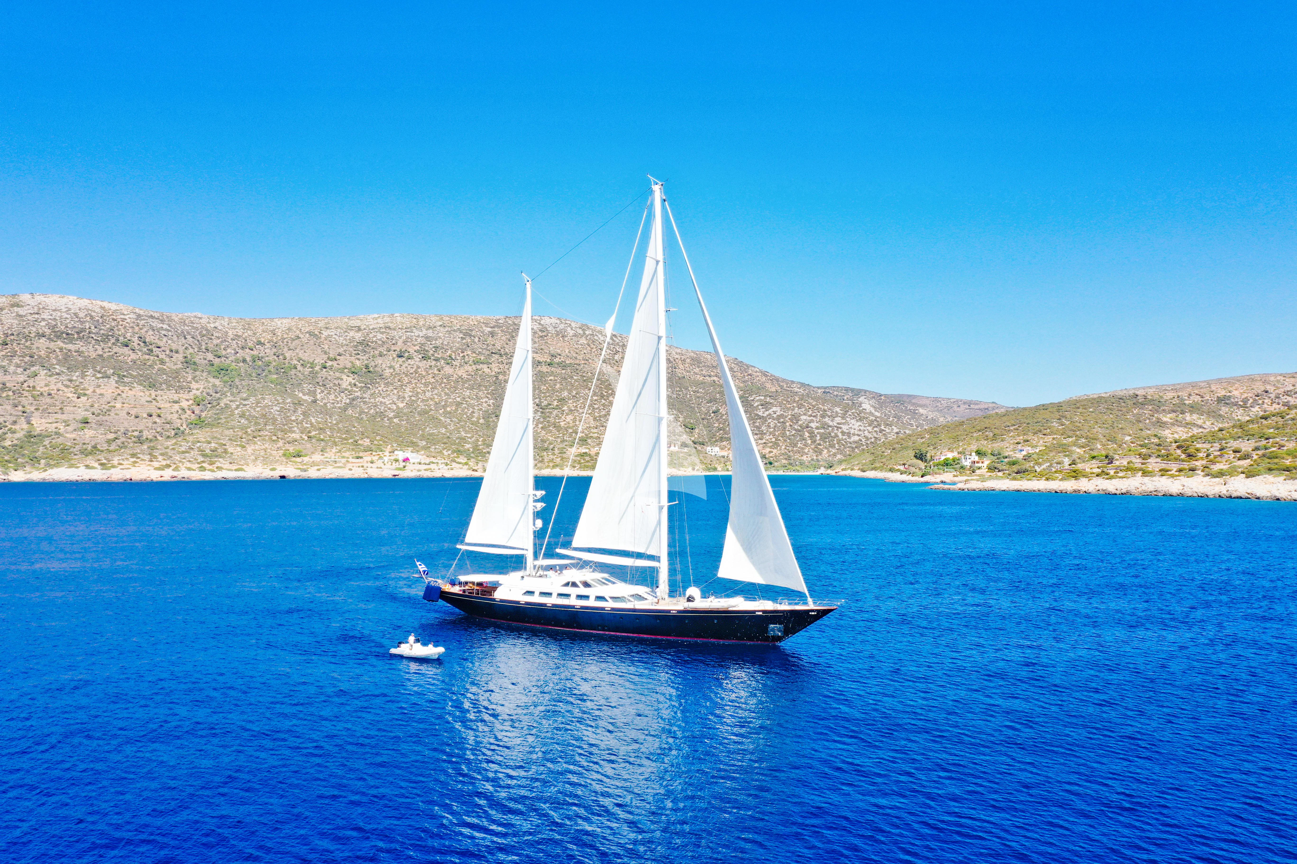 a sailboat on the water aboard TAMARITA Yacht for Sale