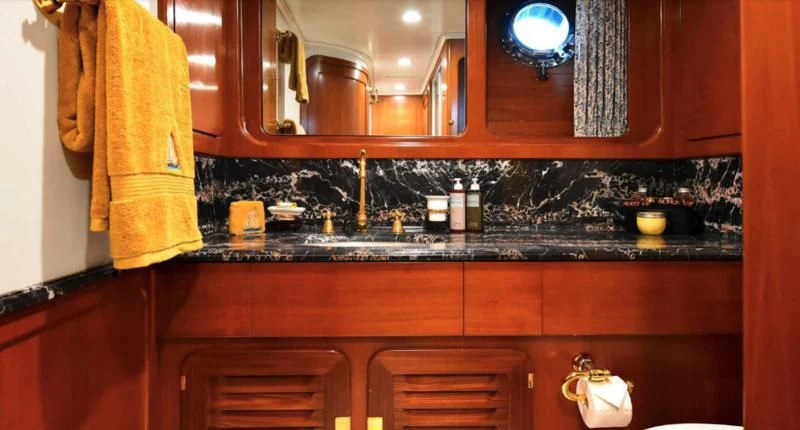 a kitchen with a countertop aboard TAMARITA Yacht for Sale