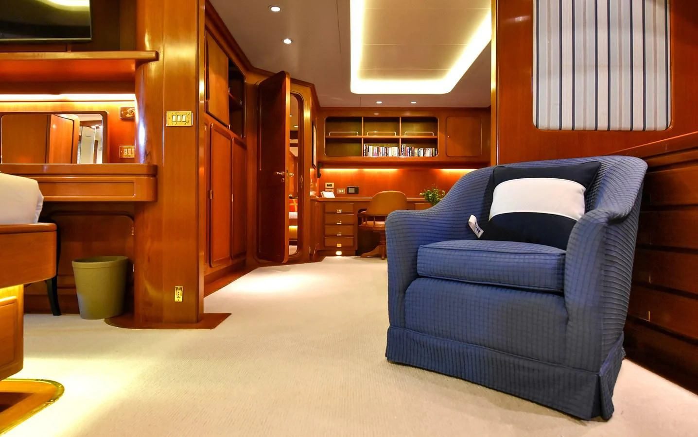 a room with a couch and a chair aboard TAMARITA Yacht for Sale